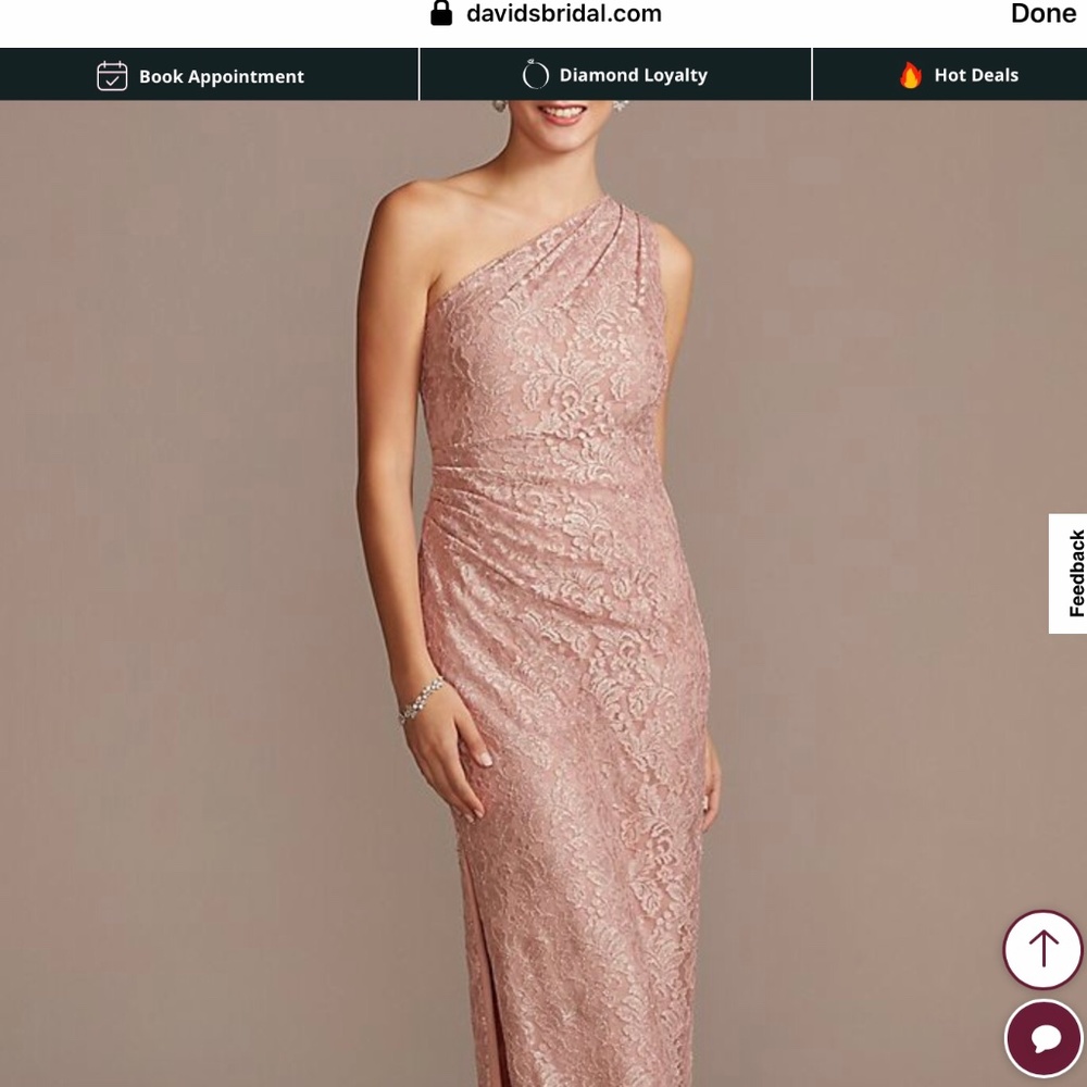 Blush colored lace one-shoulder gown